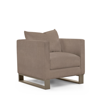 Atlin armchair with light brown textile with champagne legs